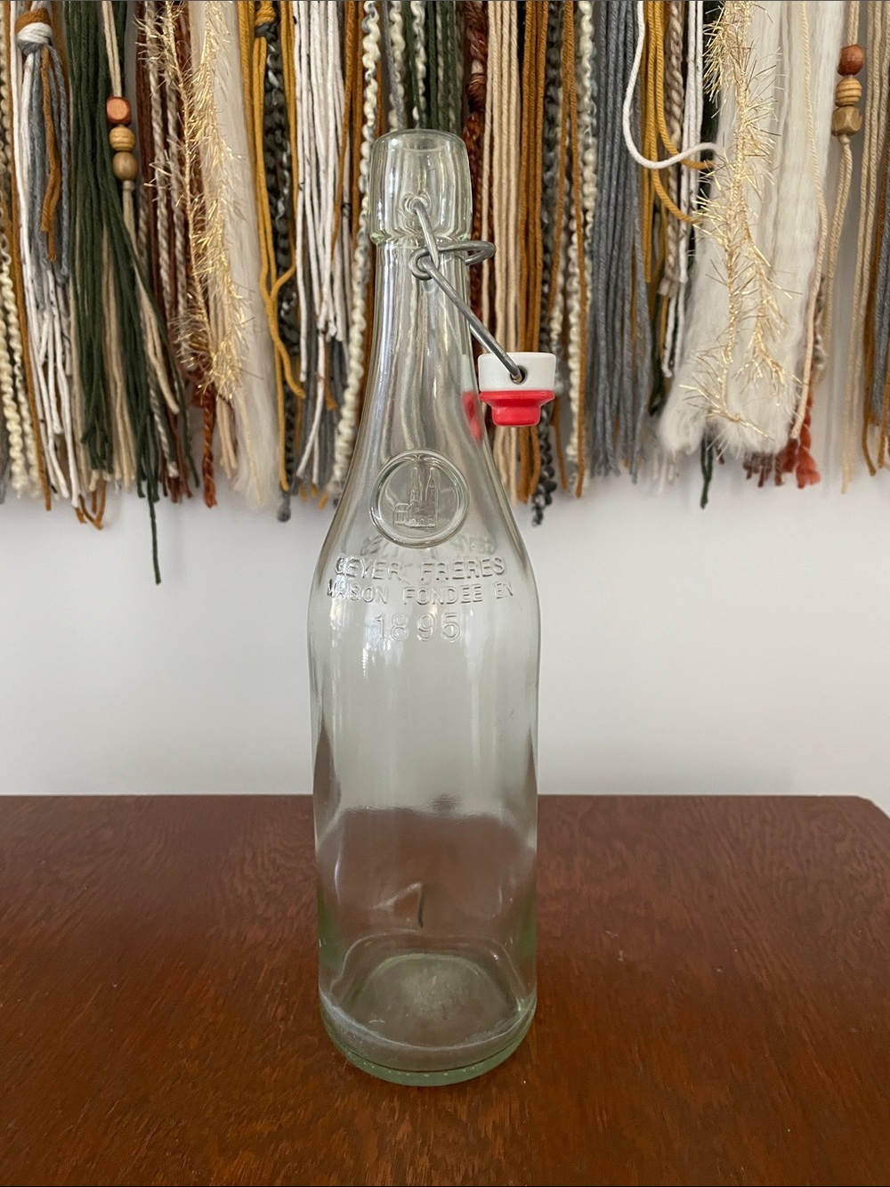Vintage glass bottle with clasp stopper